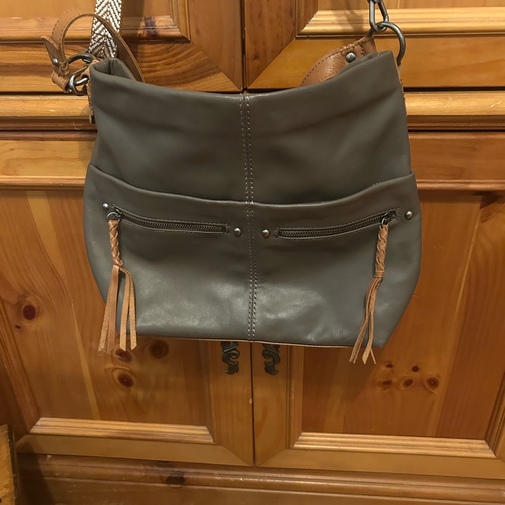 The SAK - Ashland bucket bag, 
Slate color Leather
Used one time- excellent